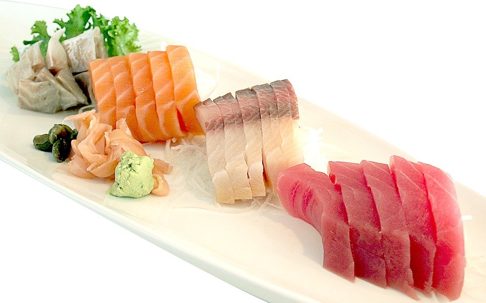 tuna and salmon prepared as sushi