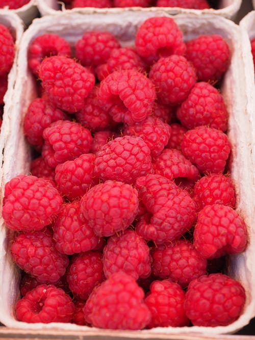 Raspberries in a container