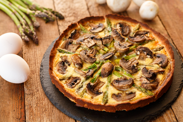 Homemade omelet with asparagus and mushrooms