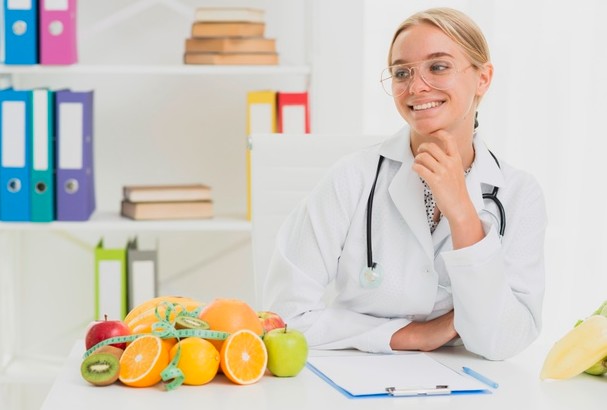 a doctor with healthy fruits