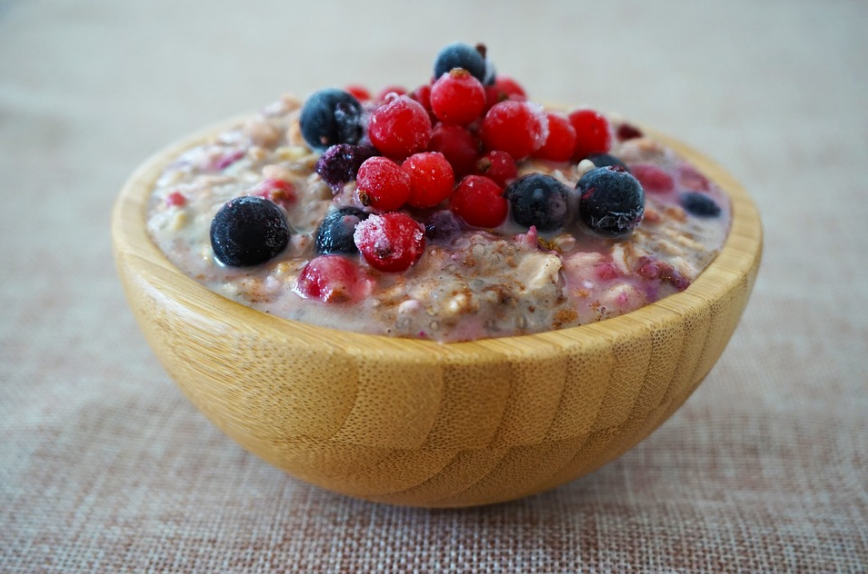 a bowl of oatmeal with fruits