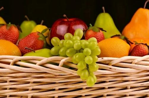 A fruit basket containing a variety of fruits