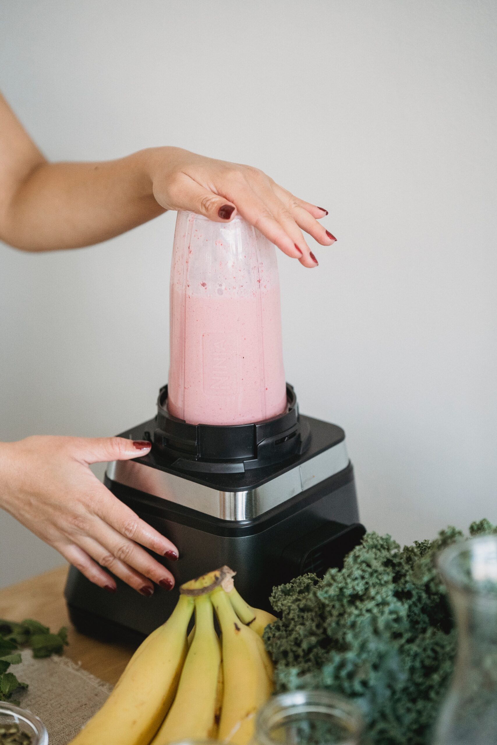 picture of a woman making smoothie